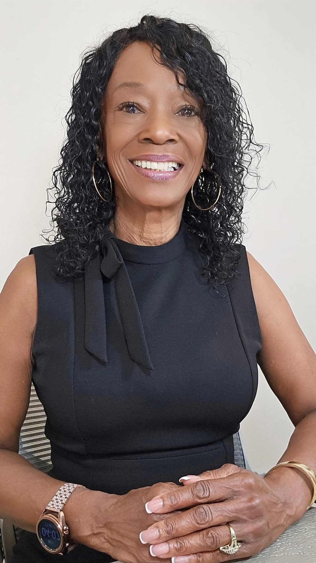 Lilisa J. Williams smiling wearing a black shirt